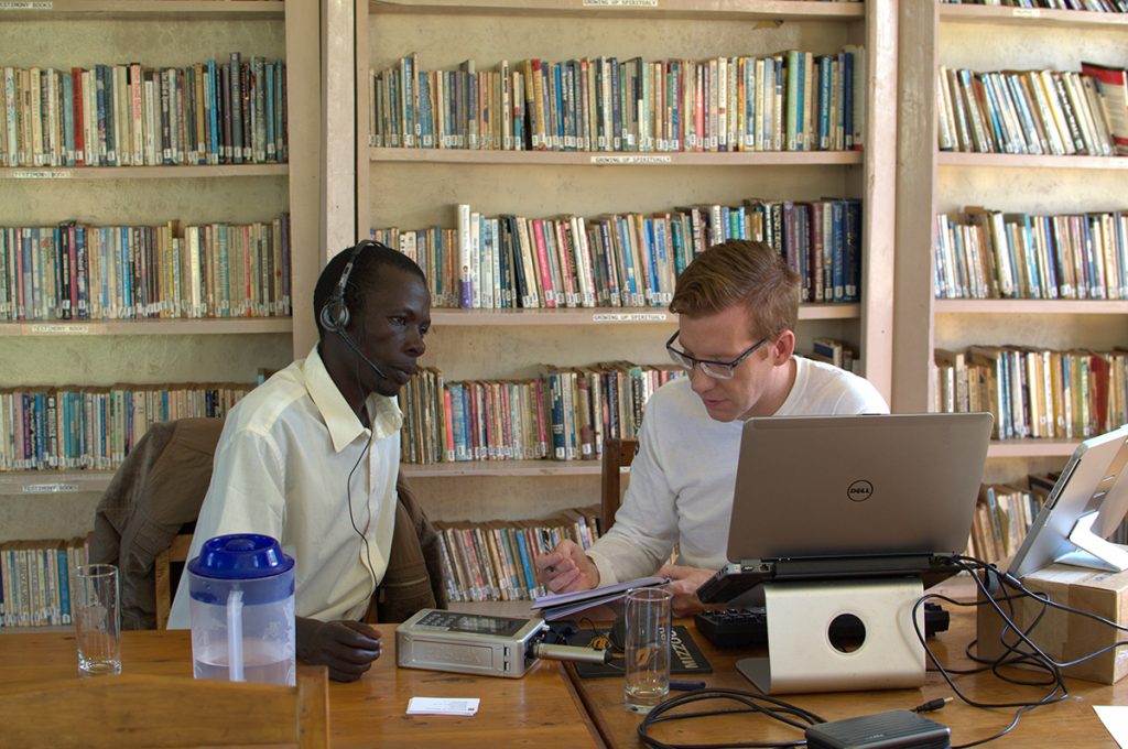 Michel Marlo documents audio folk tales with native Kenyan