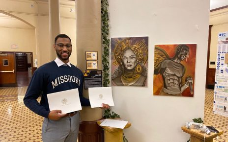 Portrait of Tyree Taylor in front of is 2020 VADS display